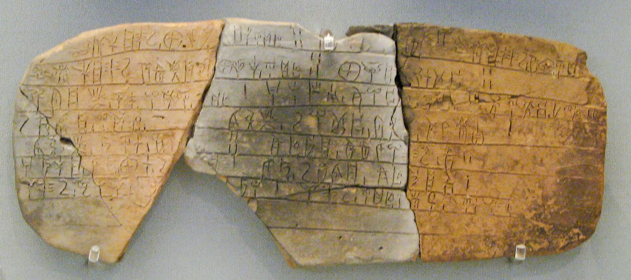 A long clay tablet with rows of incised Linear B signs, from the palace at Pylos.